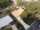 Aerial view of a single-story house with a large backyard and driveway at 1914 Alexander Dr, Lakeland, FL 33803