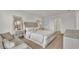 Soothing bedroom with king-size bed and seating area at 1915 Pristine Loop, Lakeland, FL 33811