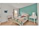 Lilo and Stitch themed bedroom with a comfortable bed and vanity at 1915 Pristine Loop, Lakeland, FL 33811