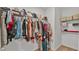 Walk-in closet with hanging rods and shelving at 1915 Pristine Loop, Lakeland, FL 33811