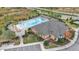 Community pool with lounge chairs and a splash pad at 1915 Pristine Loop, Lakeland, FL 33811