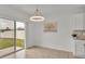 Bright dining area with sliding glass doors leading to the backyard at 1915 Pristine Loop, Lakeland, FL 33811