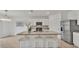 Modern kitchen with granite countertops and stainless steel appliances at 1915 Pristine Loop, Lakeland, FL 33811