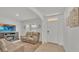 Living Room with two beige leather couches and fireplace at 1915 Pristine Loop, Lakeland, FL 33811