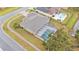 Aerial view showcasing the house and screened pool area at 2105 Normandy Heights Ln, Winter Haven, FL 33880