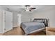 Bright bedroom with ceiling fan and wood-look floors at 2105 Normandy Heights Ln, Winter Haven, FL 33880