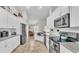 Modern kitchen with stainless steel appliances and granite countertops at 2105 Normandy Heights Ln, Winter Haven, FL 33880