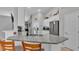 Kitchen features a large island with granite countertop and seating at 2105 Normandy Heights Ln, Winter Haven, FL 33880