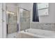 Bathroom with walk-in shower and soaking tub at 212 Kissengen Park Dr, Bartow, FL 33830