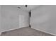 Bedroom showing neutral walls, plush carpet and the entrance to another room at 212 Kissengen Park Dr, Bartow, FL 33830