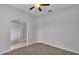 Bedroom with neutral colors, carpet, and a view of the archway to the next room at 212 Kissengen Park Dr, Bartow, FL 33830