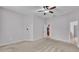 Large bedroom with plush carpet and access to bathroom at 212 Kissengen Park Dr, Bartow, FL 33830