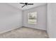 Bedroom with window, ceiling fan, and neutral walls at 212 Kissengen Park Dr, Bartow, FL 33830