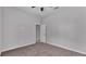 Bedroom showing a light color palette, plush carpet, and doorway access to a hallway at 212 Kissengen Park Dr, Bartow, FL 33830