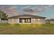 Back of house at dusk showing screened porch and yard at 212 Kissengen Park Dr, Bartow, FL 33830