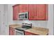 Stainless steel appliances and granite countertops in this kitchen at 212 Kissengen Park Dr, Bartow, FL 33830