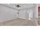 Large living room with neutral walls and carpeting at 212 Kissengen Park Dr, Bartow, FL 33830