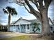 Light blue community center with parking and landscaping at 2141 Sandy Hook, Lakeland, FL 33813