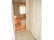 View into a bedroom with hardwood floors, neutral walls, and a sunlit window at 223 Windsor St # 3A, Lakeland, FL 33803