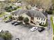 Aerial view showcasing the apartment complex, with ample parking and well-maintained landscaping at 223 Windsor St # 3A, Lakeland, FL 33803