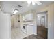 View of kitchen with white cabinets and appliances at 2266 Silver Re Dr, Lakeland, FL 33810