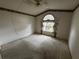 Bedroom with ceiling fan and decorative window at 2290 Silver Re Dr, Lakeland, FL 33810