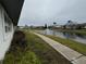 View of a pond and walkway at 2290 Silver Re Dr, Lakeland, FL 33810