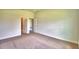 Spacious bedroom with neutral walls and carpet at 237 Piave St, Haines City, FL 33844