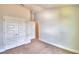 Bedroom with double doors leading to another room at 237 Piave St, Haines City, FL 33844