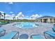 Resort-style community pool with lounge chairs at 237 Piave St, Haines City, FL 33844