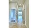 Bright hallway with tile flooring and access to other rooms at 237 Piave St, Haines City, FL 33844