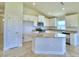 Modern kitchen featuring a large island and white cabinetry at 237 Piave St, Haines City, FL 33844