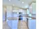 Bright kitchen with stainless steel appliances and granite countertops at 237 Piave St, Haines City, FL 33844