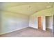 Spacious main bedroom with carpeted floor and ensuite bathroom at 237 Piave St, Haines City, FL 33844