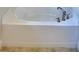 Corner bathtub with tile flooring at 245 Piave St, Haines City, FL 33844