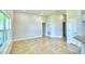 Bright living room with large window and tile flooring at 245 Piave St, Haines City, FL 33844