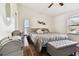 Main bedroom with king bed and window at 3220 Cherry Hill S Cir, Lakeland, FL 33810