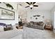 Living room with two couches and a ceiling fan at 3220 Cherry Hill S Cir, Lakeland, FL 33810