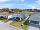 Aerial view of a single-Gathering home with a golf course nearby at 3273 Pebble Bend Dr, Lakeland, FL 33810