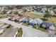 Aerial view of neighborhood with golf course at 3273 Pebble Bend Dr, Lakeland, FL 33810