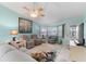 Relaxing living room featuring neutral furniture and bay window at 3273 Pebble Bend Dr, Lakeland, FL 33810