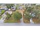 Aerial view showcasing multiple houses and yards in a residential neighborhood at 3445 Sleepy Hill Oaks St, Lakeland, FL 33810