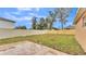 Fenced backyard with patio and grassy area at 3445 Sleepy Hill Oaks St, Lakeland, FL 33810