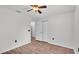 Spacious bedroom with ceiling fan and double doors at 3445 Sleepy Hill Oaks St, Lakeland, FL 33810