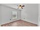 Bright bedroom with ceiling fan and wood flooring at 3445 Sleepy Hill Oaks St, Lakeland, FL 33810