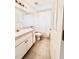 Simple bathroom with shower/tub combo and vanity at 351 Cloverdale Rd, Winter Haven, FL 33884