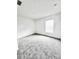 Bright bedroom with neutral walls and carpet at 351 Cloverdale Rd, Winter Haven, FL 33884