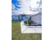 House exterior features a walkway and landscaping at 351 Cloverdale Rd, Winter Haven, FL 33884