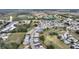 Aerial perspective showing the home's placement within a residential community near a golf course at 3618 Highland Fairways Blvd, Lakeland, FL 33810