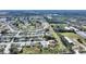 Aerial view of the house and surrounding neighborhood, highlighting its proximity to other homes and green spaces at 3618 Highland Fairways Blvd, Lakeland, FL 33810